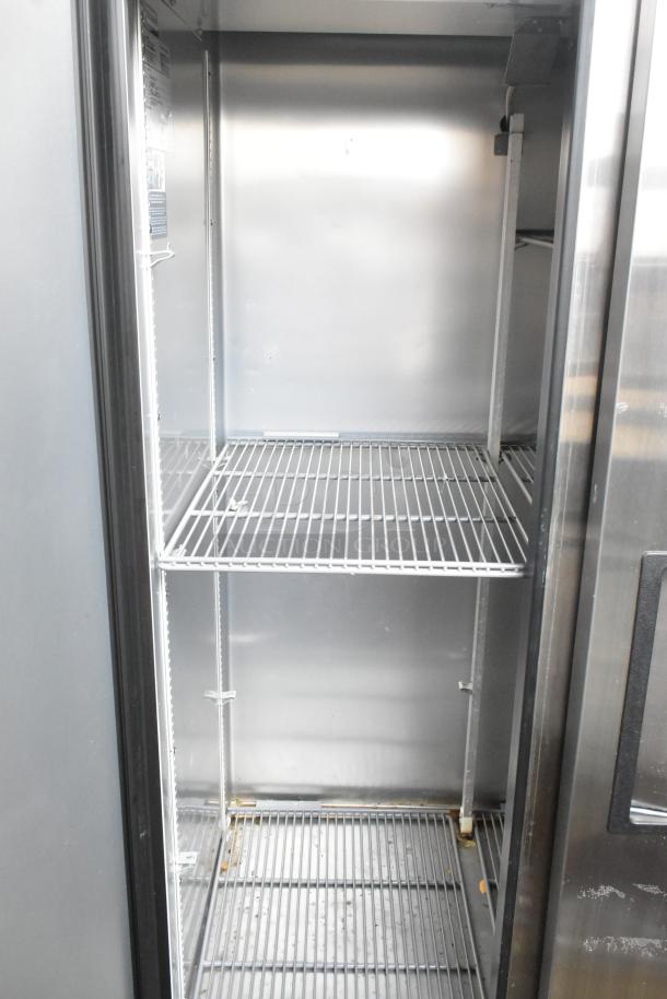 2022 True T-35-HC stainless steel 2-door commercial cooler with poly-coated racks, on casters, 115V, 1 phase.