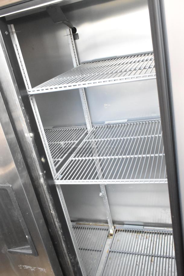 2022 True T-35-HC stainless steel commercial cooler with two doors, poly coated racks, and commercial casters.