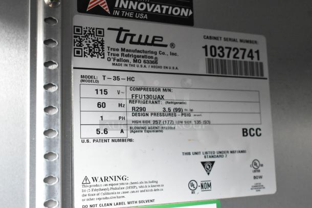 Label of True T-35-HC commercial cooler showing model, voltage, refrigerant, and UL certification details.