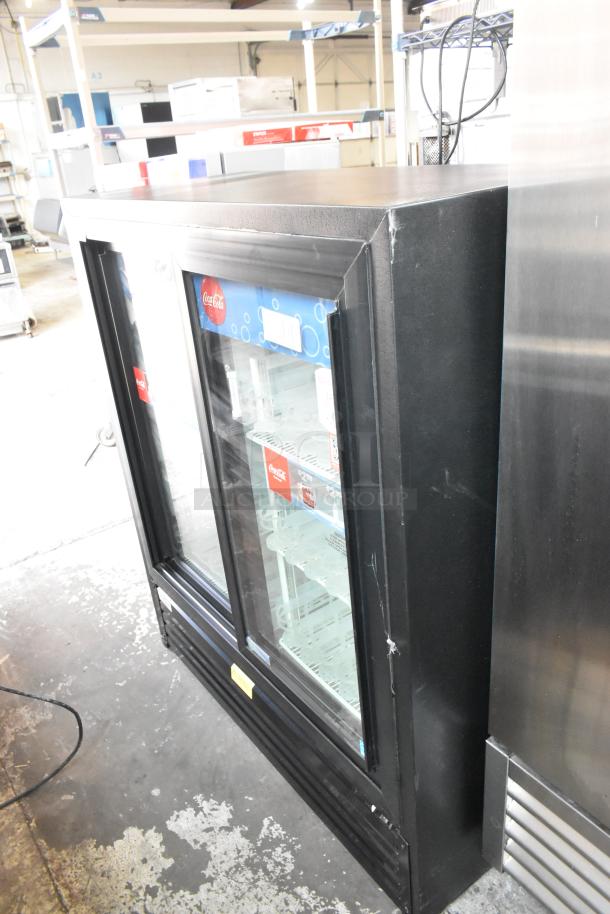 Imbera VRD41 2-door cooler merchandiser with poly-coated racks, 115 volts, features glass doors and branded decals.
