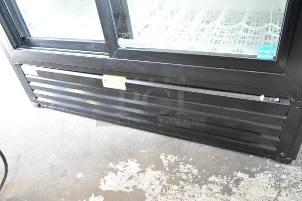 Imbera VRD41 metal commercial 2-door cooler with poly-coated racks, Energy Star certified, 115 volts, 1 phase.