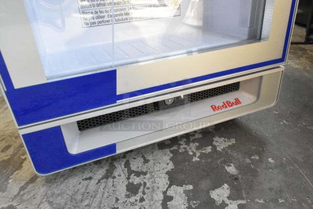 2023 Red Bull RB-SMC 130 ECO metal single door cooler, 115V, 1 phase, has Red Bull logo and visible shelf space.