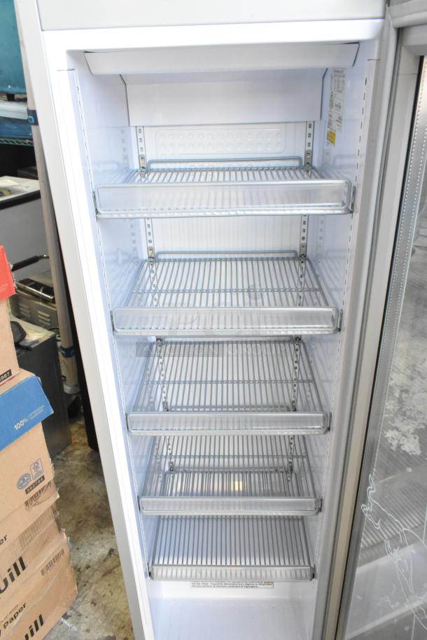 2023 Red Bull RB-SMC 130 ECO cooler, single door, metal finish, several wire shelves, 115V, excellent condition.