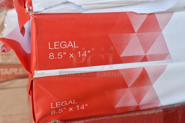Five boxes of legal-sized copy paper, each labeled "Legal 8.5'' x 14''." Additional 8 reams included. Slight wear on packaging.