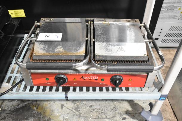 Avantco 177P84 Stainless Steel Commercial Double Panini Press, showing rust and wear, power knobs and label visible.