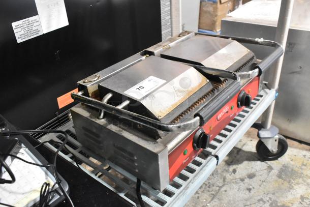 Avantco 177P84 stainless steel double panini press on a cart. Features red control panel, dual knobs, and visible wear.