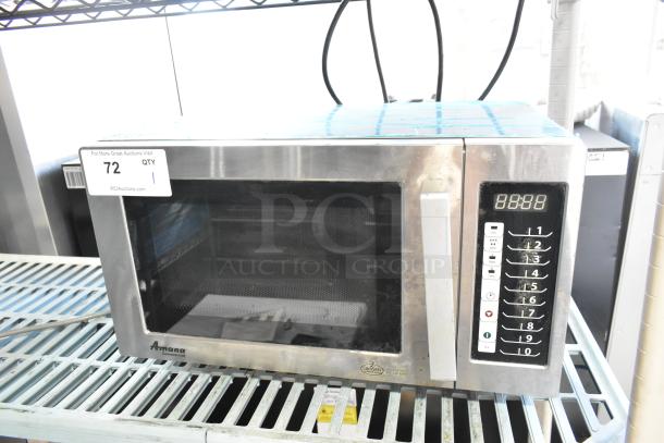 2017 Amana RMS10TS stainless steel countertop microwave oven, 120 volts, 1 phase. Visible numeric keypad; condition appears used.