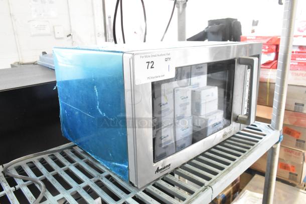 2017 Amana RMS10TS stainless steel countertop microwave, 120 volts, 1 phase, visible wear on exterior.