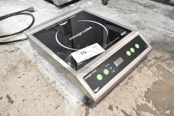 Vollrath 59300 stainless steel induction range, single burner, 120V, new condition, labeled "mirage cadet" with control panel.