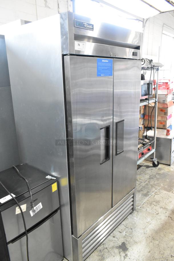2020 True T-19F-HC stainless steel commercial single door reach-in freezer, poly coated racks, commercial casters, 115V.