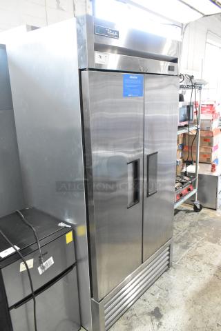2020 True T-19F-HC stainless steel commercial single door reach-in freezer, poly coated racks, commercial casters, 115V.