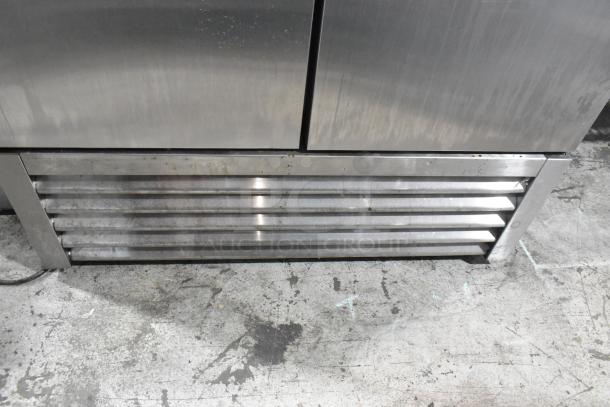 2020 True T-19F-HC stainless steel commercial freezer, poly coated racks, on casters; single door, front vent.