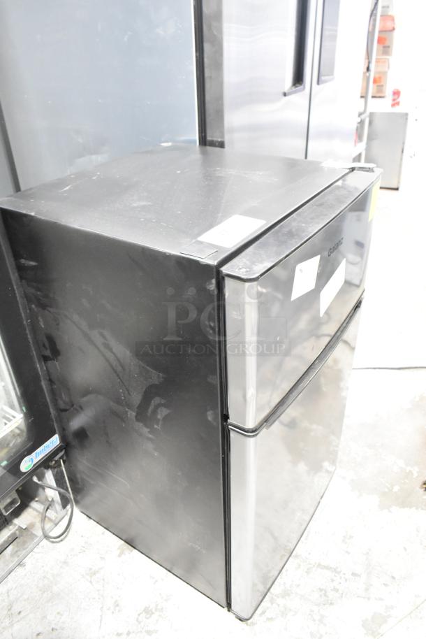 Galanz GLR31TS1E02 Mini Cooler with Freezer, 115V, black finish, compact size. Visible scratches, labels showing brand and model.