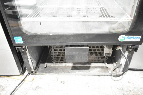 Imbera VR10 commercial single door reach-in cooler with poly-coated racks. Features Energy Star label, 115 volts, 1 phase.