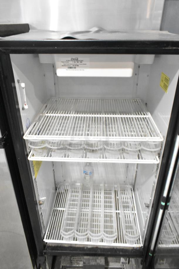 Imbera VR10 commercial cooler, single door, metal, with poly-coated racks, 115V, 1 phase, visible interior labels.