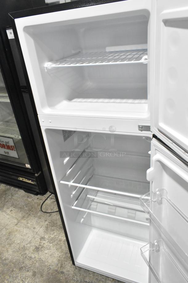 Frigidaire EFR780-B-6COM reach-in cooler with freezer, 115 volts, 1 phase, shown open with shelves and storage.