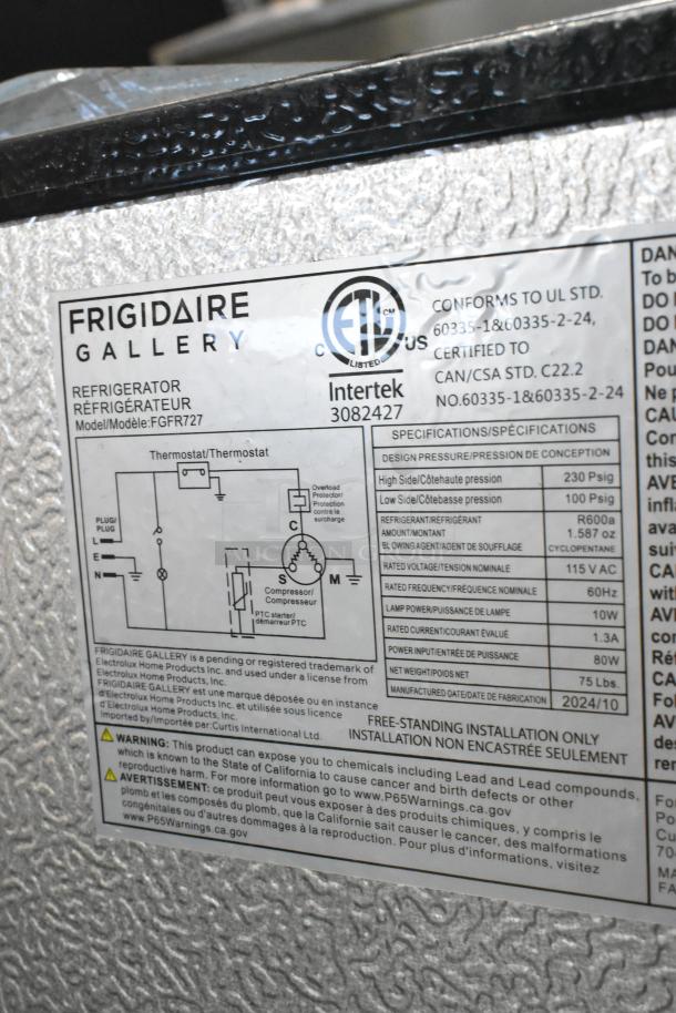 Frigidaire FGFR727 reach-in cooler label showing specifications and certifications, 115 volts, 1 phase, model FGFR727.