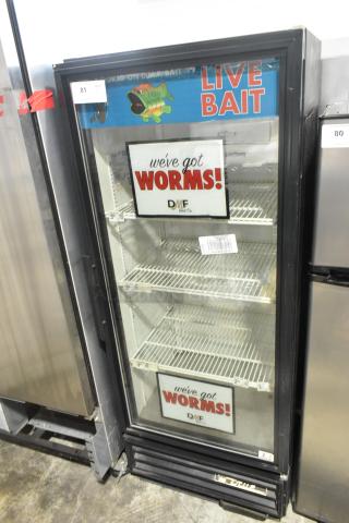 True GDM-12 commercial single door cooler, metal frame, poly coated racks, 115V, signage visible, used condition.