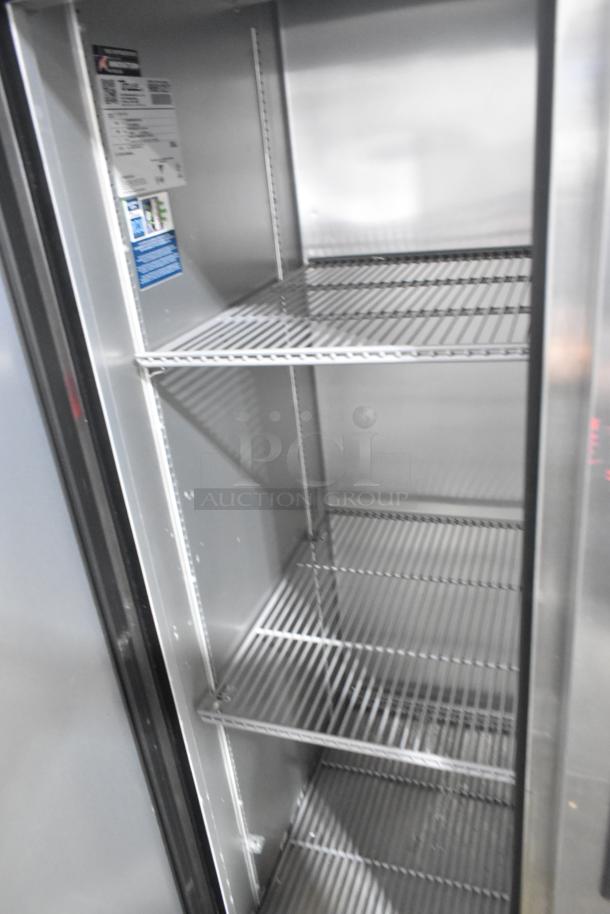 2019 True T-35-HC stainless steel commercial cooler, 2 doors, poly-coated racks, on casters, 115V, 1 phase, interior labels visible.