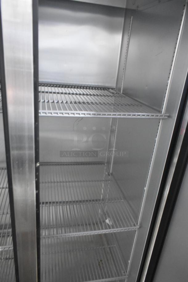 2019 True T-35-HC stainless steel 2-door cooler with poly-coated racks, commercial casters, 115 volts, 1 phase.