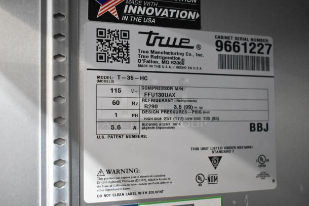 2019 True T-35-HC Stainless Steel 2 Door Reach-In Cooler with poly-coated racks, on commercial casters. Serial: 9661227.