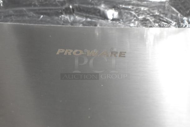 Brand new Pro Ware metal fry scooper with slight cosmetic damage visible. Logo stamped on surface.