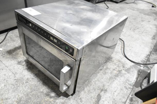 Menumaster MDC182 stainless steel commercial countertop microwave oven, 208/230 volts, 1 phase, visible keypad, slight wear.