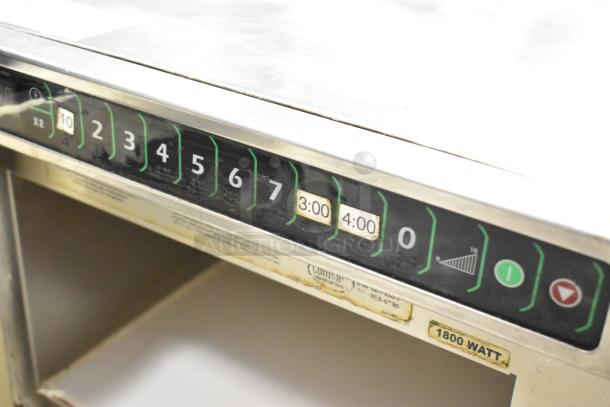 Menumaster MDC182 stainless steel commercial microwave, 1800 watt, 208/230 volts, 1 phase, visible control panel, used.