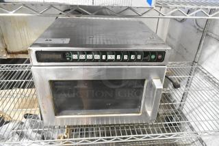 Menumaster MDC182 stainless steel commercial microwave oven, 208/230V, 1 phase. Visible keypad, minor wear.