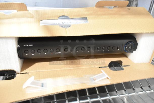 Lorex ECO4 960H digital video surveillance recorder in original packaging. Model features buttons and dial controls.