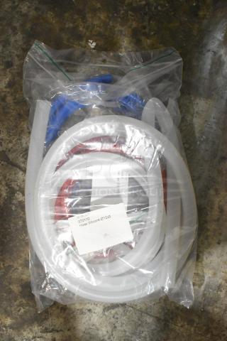 Bag of brand new silicone hoses and stacking kits, labeled "Hose Silicone Ø12x3."