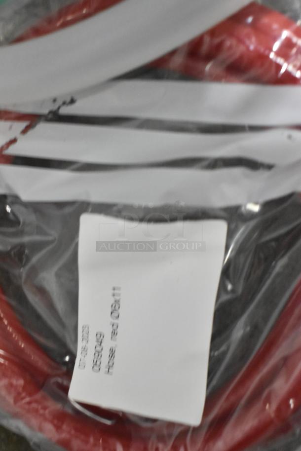 Lot of brand new silicone hoses and stacking kits in packaging. Label reads "Hose, red" and includes codes.