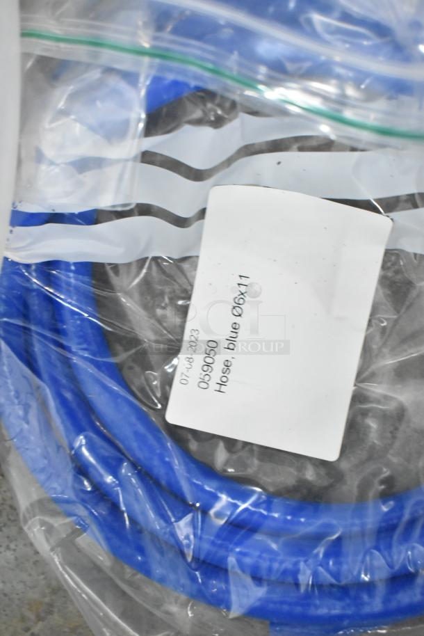 Brand new silicone hose, blue, size 06x11, in sealed plastic bag with labeling.