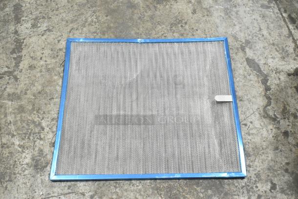 Two metal filters with a blue frame on a concrete floor, showcasing a mesh design. Appears in good condition.