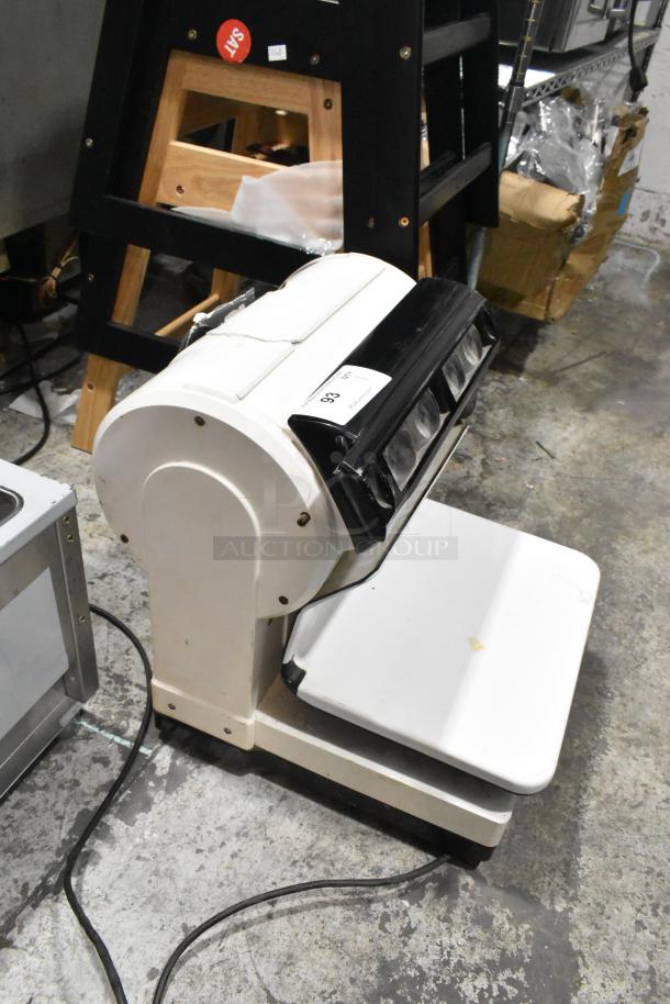 Toledo 3575EA metal countertop scale, 110V, 1-phase, shows a sturdy design and moderate wear. Auction tag "93".