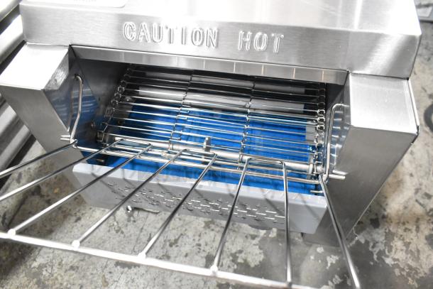 Brand new Avantco 184T140 stainless steel conveyor toaster, 10" wide, 3" opening, 300 slices/hour, 120V, labeled "CAUTION HOT".