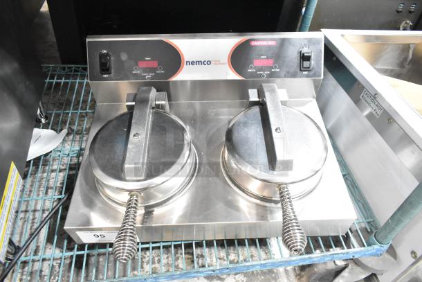 Brand new Nemco 7000A-2S stainless steel dual waffle maker, features SilverStone non-stick surface, 120 volts, 1 phase.