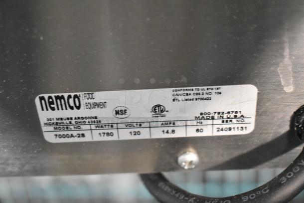 Stainless steel label on Nemco 7000A-2S waffle maker, showing model, 1780 watts, 120 volts, 14.8 amps, Made in U.S.A.