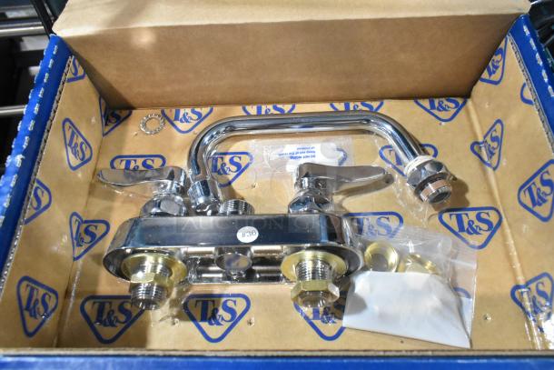 2 new T&S B-1110 deck mounted workboard faucets, 4" centers, 6" swing nozzle, scratch and dent condition. Marked #36.