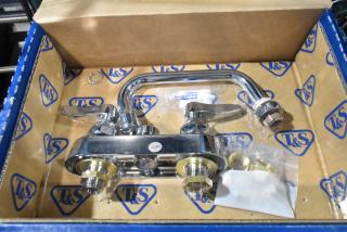 2 new T&S B-1110 deck mounted workboard faucets, 4" centers, 6" swing nozzle, scratch and dent condition. Marked #36.
