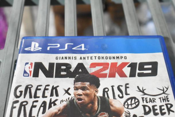 PS4 NBA 2K19 game case featuring Giannis Antetokounmpo, shows logo and cover art. Near-new condition.