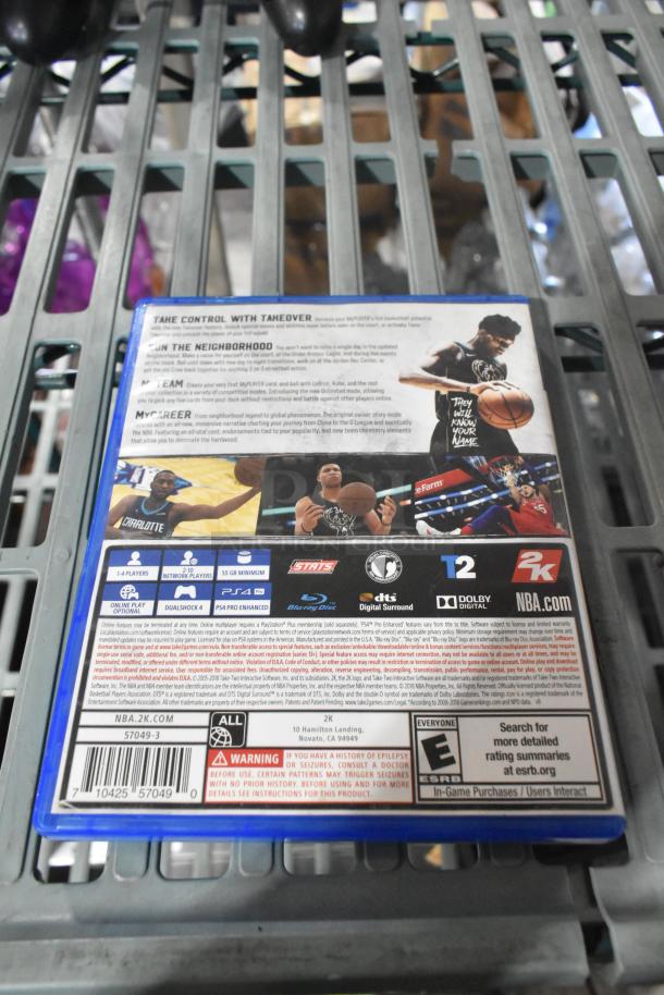 Back cover of PS4 NBA 2K19 game case with game features and branding logos visible; part of a 4-item auction lot.