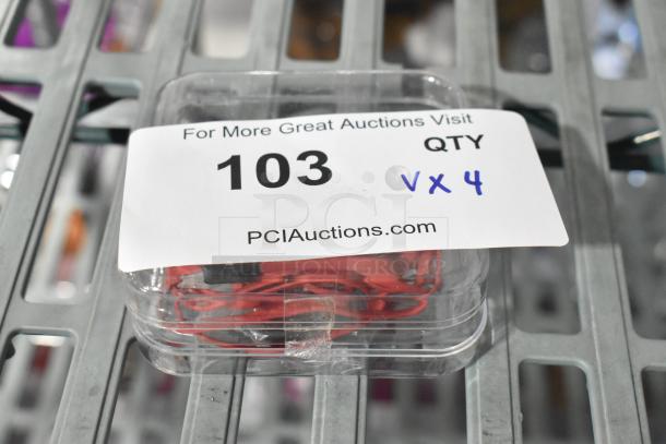 4 various items in clear packaging, including PS4 NBA 2K19, headphones, PlayStation controller, and earphones. Marked "103, QTY x4."