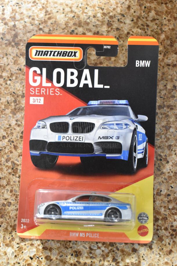 Matchbox Global Series BMW M5 Police car in original packaging. Features Polizei graphics, part of Matchbox Global Series 3/12.