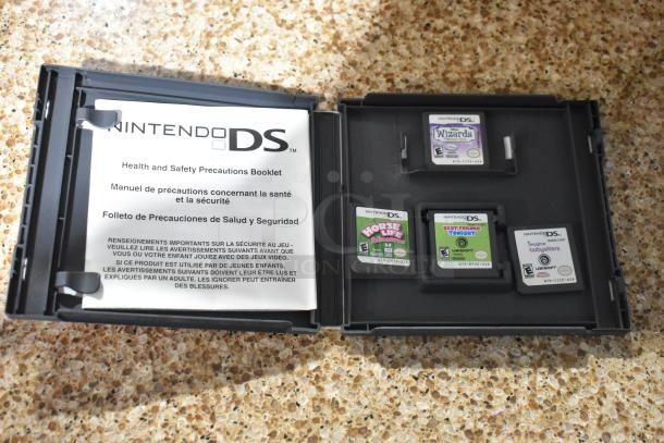 Nintendo DS game case with manuals and four game cartridges: Wizards, Horse Life, Best Friends Tonight, Imagine Babysitters.