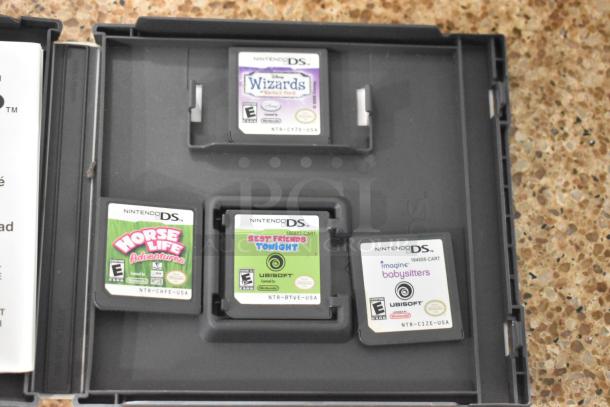 Nintendo DS game cartridges in a case, featuring Horse Life Adventures, Best Friends Tonight, Imagine Babysitters, Wizards.