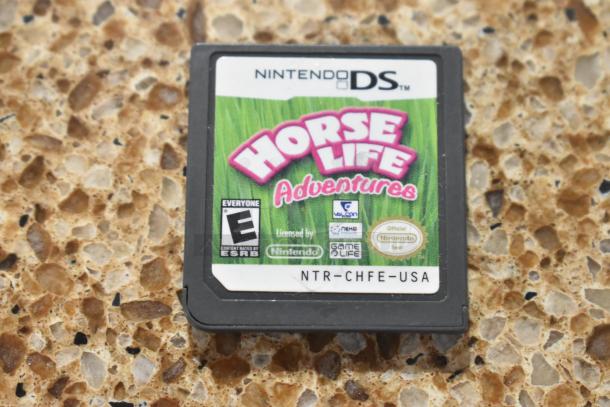 Nintendo DS Horse Life Adventures game cartridge in good condition, rated E for Everyone, with official Nintendo seal.