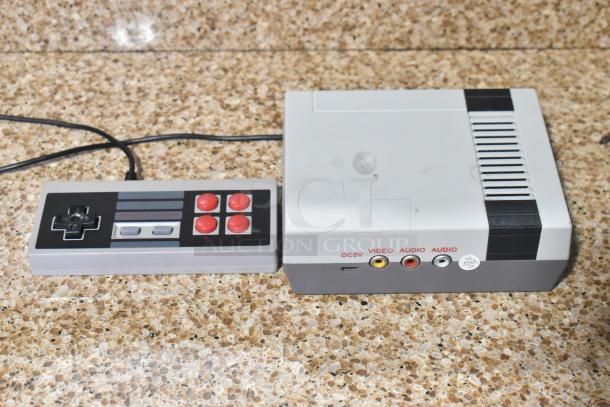 Coolbaby RS-41 game console with controller, shows DC5V, AV ports, and QC passed sticker. In good condition.