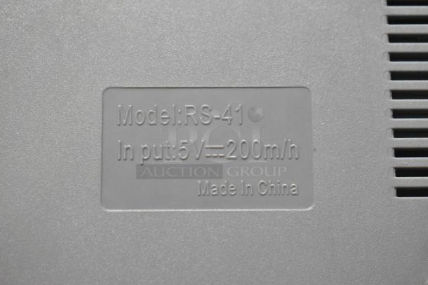 Embossed label on Coolbaby RS-41 console, showing "Model: RS-41, Input: 5V 200m/h, Made in China" stamp.