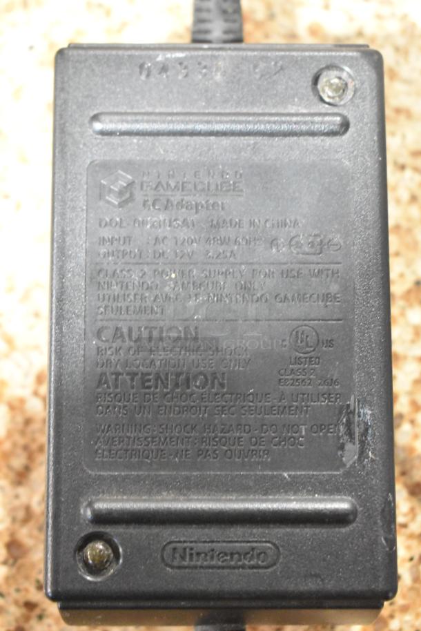 Nintendo GameCube AC Adapter, model DOL-002, input AC 120V 48W, output DC 12V 3.25A, for GameCube use only.